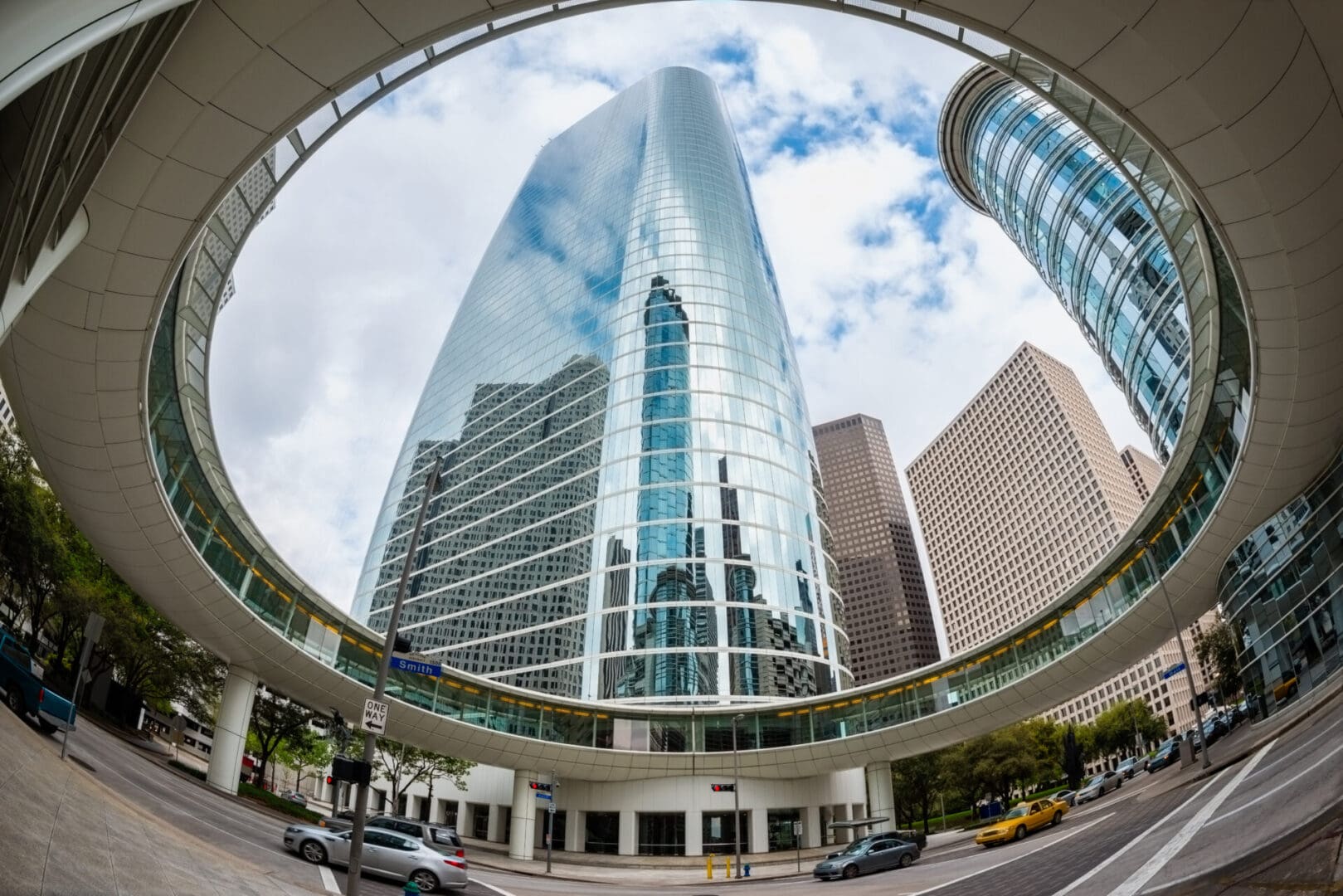 A view of the city from below, looking up at a building.