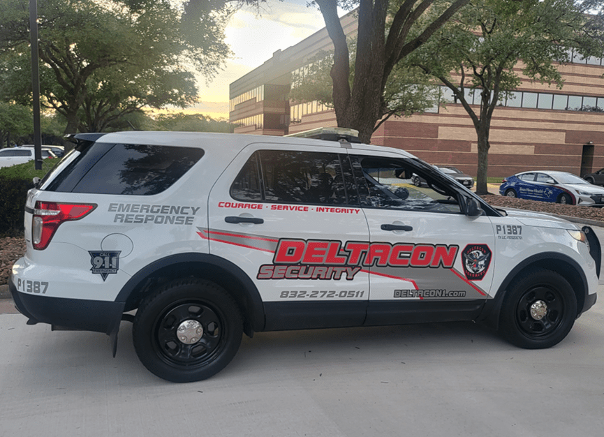 A police car parked in front of a building.